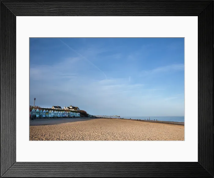 Framed Print : A row of colourful beach-huts on the beach at Southwold in the county of Suffolk, United Kingdom Framed Print : A row of colourful beach-huts on the beach at Southwold in the county of Suffolk, United Kingdom