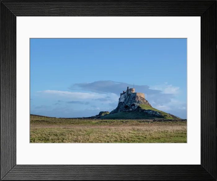 Framed Print : The 16th century Lindisfarne Castle on a hillock overlooking the island of Lindisfarne, United Kingdom Framed Print : The 16th century Lindisfarne Castle on a hillock overlooking the island of Lindisfarne, United Kingdom