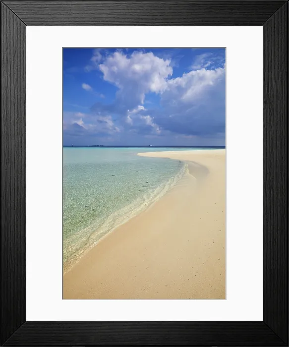 Framed Print : Pristine shallow waters lap against the white coral sand of a tropical beach; Havodda Island, Gaafu Dhaalu atoll, Maldives Framed Print : Pristine shallow waters lap against the white coral sand of a tropical beach; Havodda Island, Gaafu Dhaalu atoll, Maldives