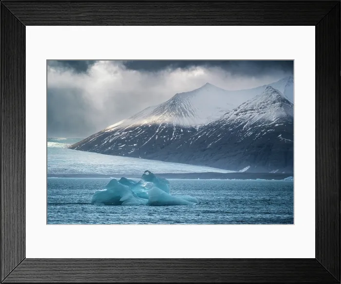 Framed Print : Iceberg on Jokulsarlon Iceberg Lagoon backed by the Breithamerkurjokull Glacier, Vatnajokull National Park, Southern Iceland, Europe Framed Print : Iceberg on Jokulsarlon Iceberg Lagoon backed by the Breithamerkurjokull Glacier, Vatnajokull National Park, Southern Iceland, Europe