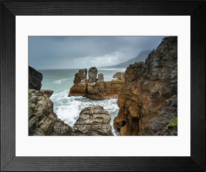 Framed Print : Dramatic Rock Spires and Crashing Waves at Pancake Rocks, Punakaiki, Paparoa National Park, West Coast, New Zealand Framed Print : Dramatic Rock Spires and Crashing Waves at Pancake Rocks, Punakaiki, Paparoa National Park, West Coast, New Zealand