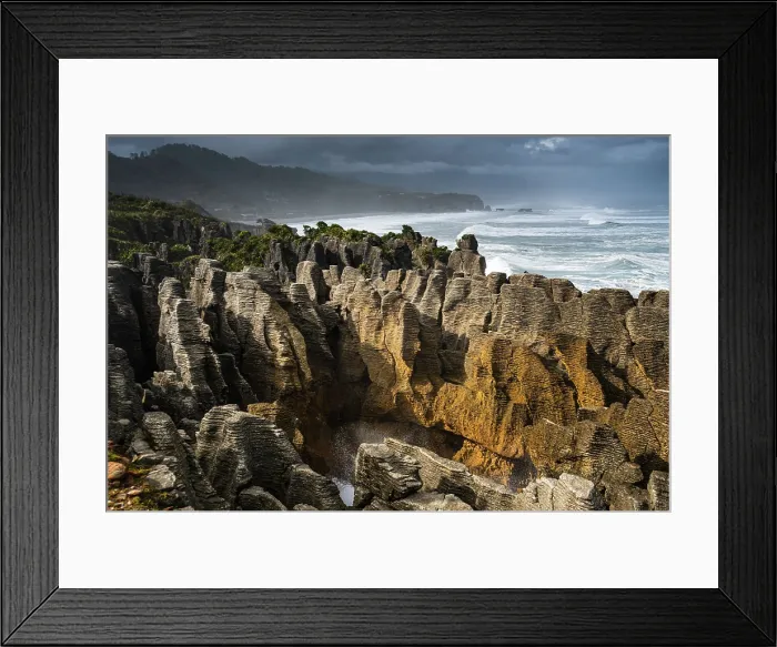 Framed Print : Classic Layered Limestone Formations of Pancake Rocks Framed by Dramatic Coastline, Punakaiki, West Coast, New Zealand Framed Print : Classic Layered Limestone Formations of Pancake Rocks Framed by Dramatic Coastline, Punakaiki, West Coast, New Zealand