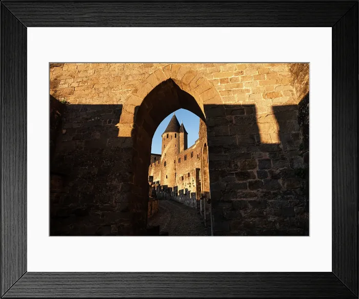 Framed Print : Medieval Castle Towers Framed by Archway in Carcassonne at Sunsee, Aude, Languedoc-Roussillon, France Framed Print : Medieval Castle Towers Framed by Archway in Carcassonne at Sunsee, Aude, Languedoc-Roussillon, France