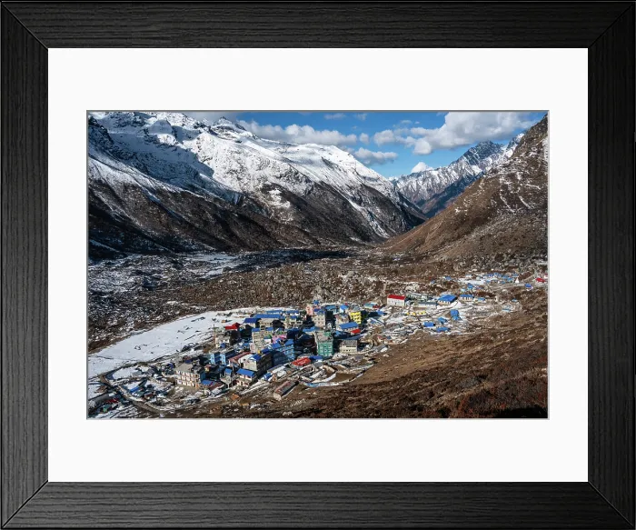 Framed Print : High-angle view of colorful buildings in Kyanjin Gompa village nestled in the snow-dusted Langtang Valley, Nepal Framed Print : High-angle view of colorful buildings in Kyanjin Gompa village nestled in the snow-dusted Langtang Valley, Nepal