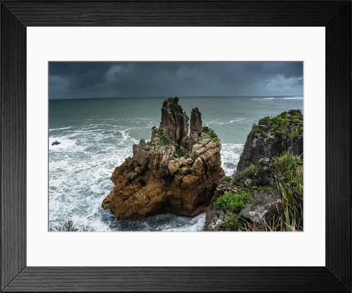 Framed Print : Sea Stack Rising from the Ocean at the Edge of Pancake Rocks, Punakaiki, West Coast, New Zealand Framed Print : Sea Stack Rising from the Ocean at the Edge of Pancake Rocks, Punakaiki, West Coast, New Zealand