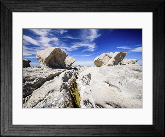 Framed Print : Rounded Coastal Rock Structures on Bleached Limestone Beds at Ward Beach, Marlborough, New Zealand Framed Print : Rounded Coastal Rock Structures on Bleached Limestone Beds at Ward Beach, Marlborough, New Zealand