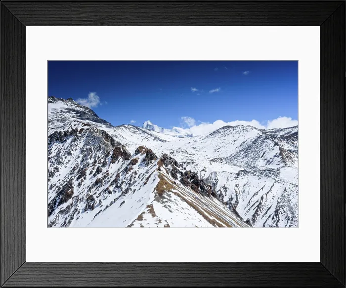 Framed Print : Snowy Ridge Trail Leading South Toward Ganja La Pass with Far Distant View of the Rolwaling Himalaya from Kyanjin Ri Framed Print : Snowy Ridge Trail Leading South Toward Ganja La Pass with Far Distant View of the Rolwaling Himalaya from Kyanjin Ri