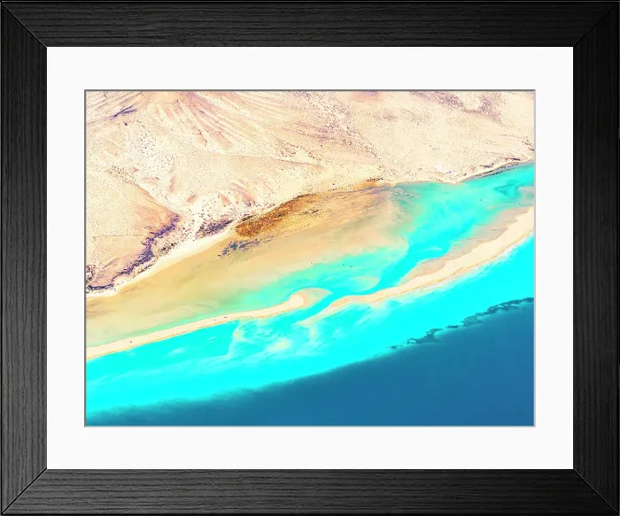 Framed Print : Overhead view of volcanic cliffs overlooking the crystal sea, Sotavento beach, Jandia, Fuerteventura, Canary Islands, Spain Framed Print : Overhead view of volcanic cliffs overlooking the crystal sea, Sotavento beach, Jandia, Fuerteventura, Canary Islands, Spain