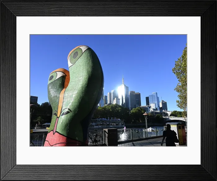 Framed Print : Modern Sculpture and city skyline
