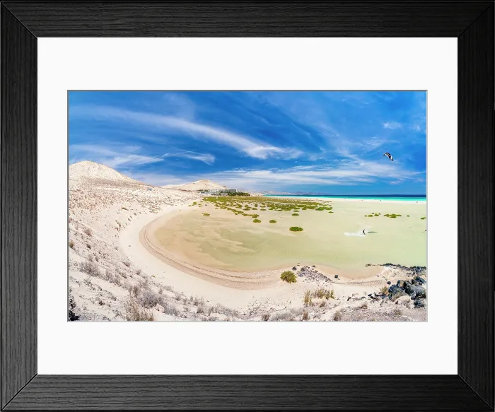 Framed Print : Kite surfer riding waves in the crystal sea, Sotavento beach, Jandia Natural Park, Fuerteventura, Canary Islands, Spain Framed Print : Kite surfer riding waves in the crystal sea, Sotavento beach, Jandia Natural Park, Fuerteventura, Canary Islands, Spain