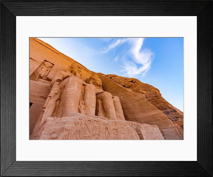 Framed Print : Low angle view of majestic statues on facade of the Temple of Ramses II, Abu Simbel, Aswan, Egypt Framed Print : Low angle view of majestic statues on facade of the Temple of Ramses II, Abu Simbel, Aswan, Egypt