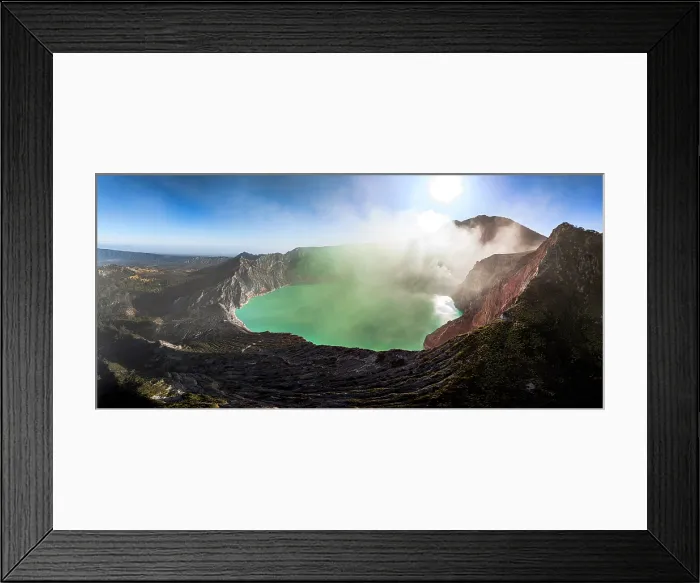 Framed Print : Aerial view of smoke above the turquoise lake on crater of Kawah Ijen volcano, Banyuwangi, East Java, Indonesia Framed Print : Aerial view of smoke above the turquoise lake on crater of Kawah Ijen volcano, Banyuwangi, East Java, Indonesia
