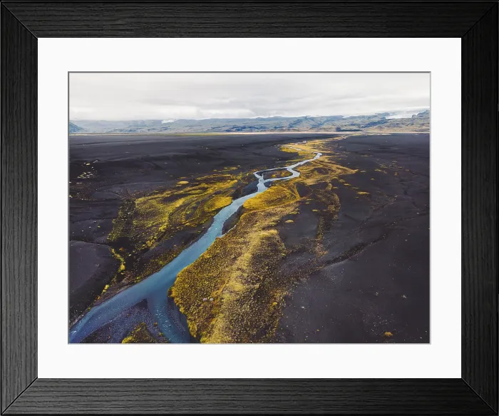 Framed Print : Black volcanic sand beaches in Iceland, a view towards the mainland with a river running trough and some yellow foliage around the water Framed Print : Black volcanic sand beaches in Iceland, a view towards the mainland with a river running trough and some yellow foliage around the water