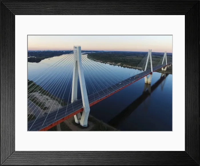 Framed Print : Beautiful bridge over the river. The bridge on the cables is road