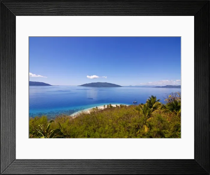 Framed Print : Crystal clear water and white sand beach, in the background Nosy Komab Framed Print : Crystal clear water and white sand beach, in the background Nosy Komab