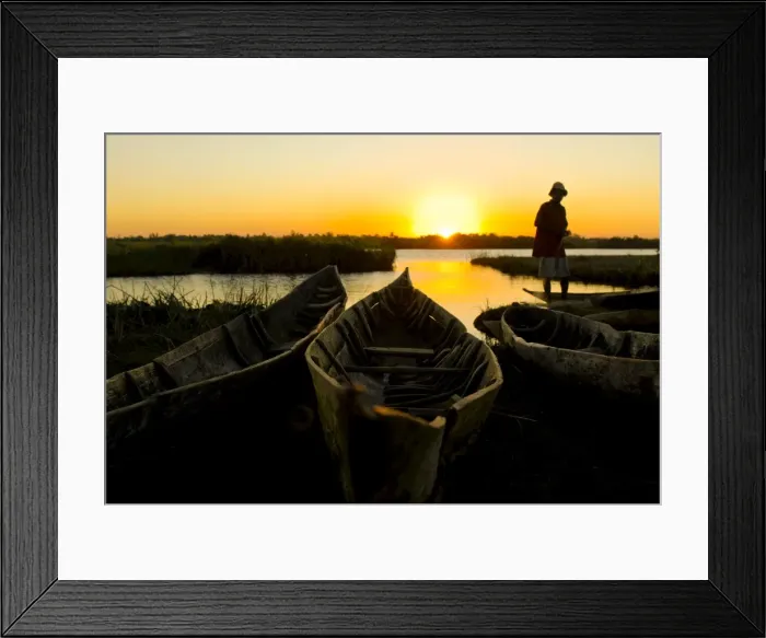 Framed Print : Fisherman repairs his net at sunset, Canal des Pangalanes, Mankara, Madagascar Framed Print : Fisherman repairs his net at sunset, Canal des Pangalanes, Mankara, Madagascar