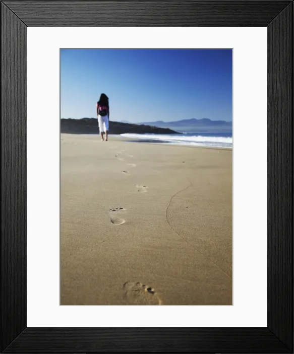 Framed Print : Woman walking on beach, Plettenberg Bay, Western Cape, South Africa, Africa Framed Print : Woman walking on beach, Plettenberg Bay, Western Cape, South Africa, Africa