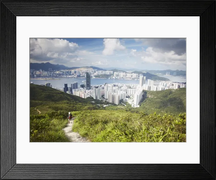 Framed Print : Man hiking on trail through hills behind Quarry Bay, Hong Kong, China, Asia Framed Print : Man hiking on trail through hills behind Quarry Bay, Hong Kong, China, Asia