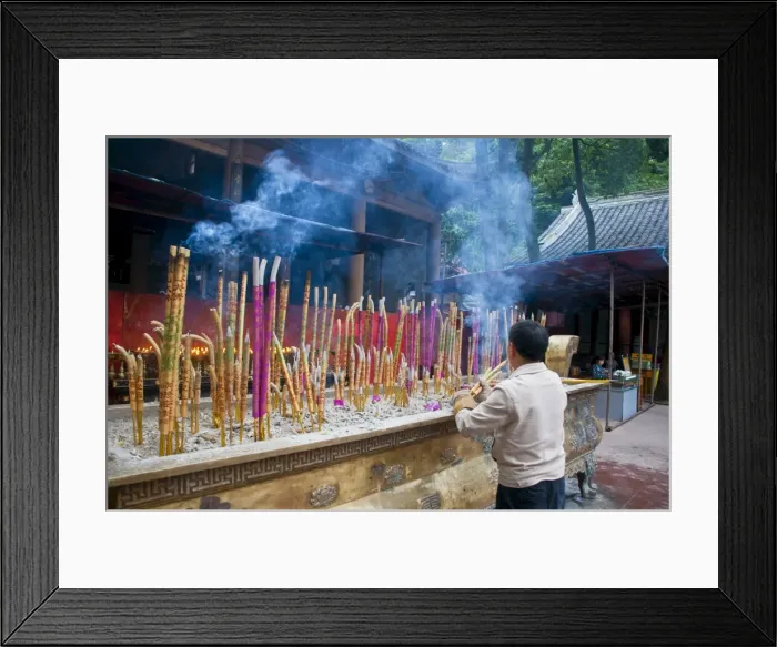 Framed Print : Burning sticks of Tibetan incense in a monastery above the giant Buddha of Leshan Framed Print : Burning sticks of Tibetan incense in a monastery above the giant Buddha of Leshan