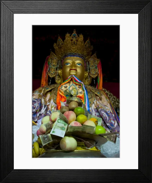 Framed Print : Buddha with sacrifical offerings in a little temple in Lhasa, Tibet, China, Asia Framed Print : Buddha with sacrifical offerings in a little temple in Lhasa, Tibet, China, Asia