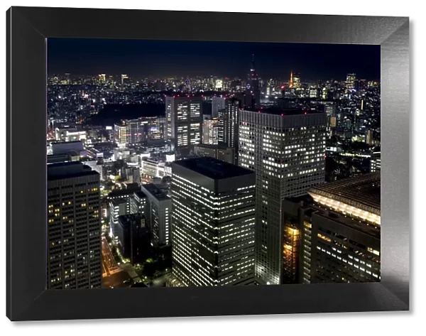 Night skyline view of Tokyos endless urban sprawl and development near South Shinjuku