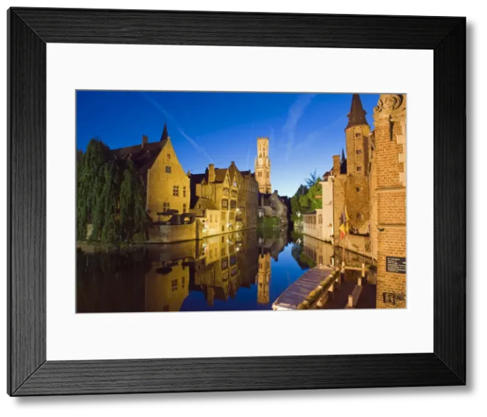 Framed Print : Reflection in canal of Belfort (belfry tower) illuminated at night, Old Town Framed Print : Reflection in canal of Belfort (belfry tower) illuminated at night, Old Town