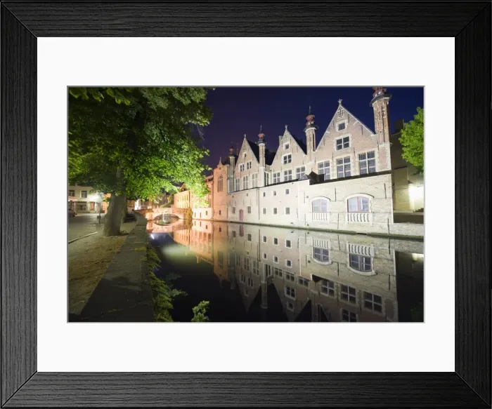 Framed Print : Reflection of houses in a canal illuminated at night, Old Town, UNESCO World Heritage Site