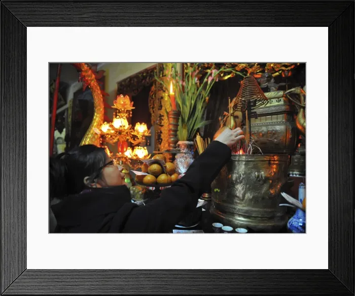 Framed Print : Woman praying in a Hanoi Buddhist temple, Hanoi, Vietnam, Indochina, Southeast Asia, Asia Framed Print : Woman praying in a Hanoi Buddhist temple, Hanoi, Vietnam, Indochina, Southeast Asia, Asia
