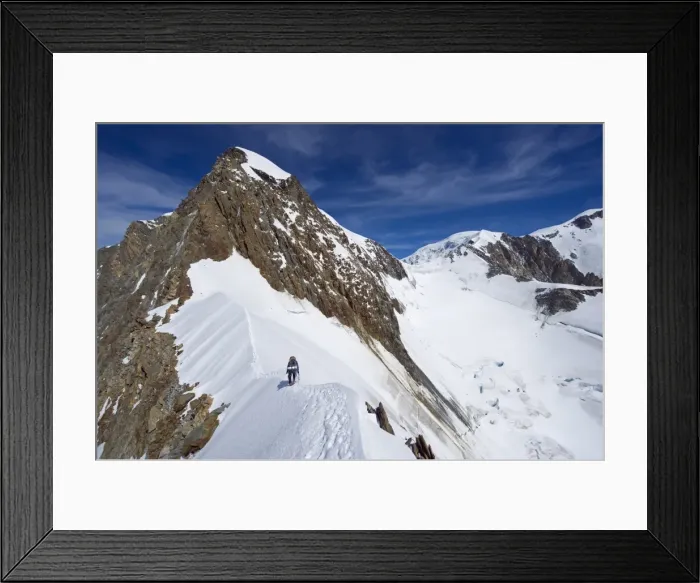 Framed Print : Climber on snow ridge, Aiguille de Bionnassay on the route to Mont Blanc Framed Print : Climber on snow ridge, Aiguille de Bionnassay on the route to Mont Blanc
