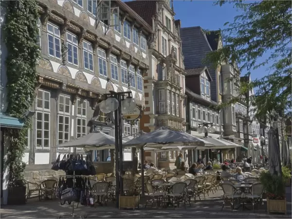 Medieval gables form a background to pavement cafes in Hamelin, Lower Saxony