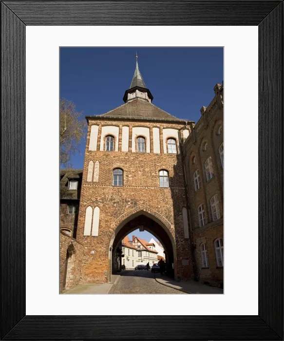 Framed Print : The Kuetertor gateway arches over the street in Stralsund, Mecklenburg-Vorpommern Framed Print : The Kuetertor gateway arches over the street in Stralsund, Mecklenburg-Vorpommern