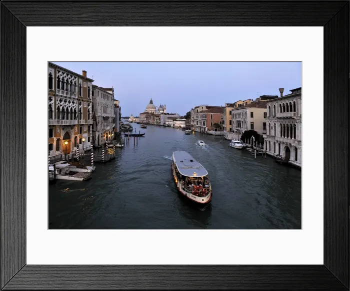 Framed Print : Evening view of a vaporetto (water bus) on the Grand Canal, Venice, UNESCO World Heritage Site Framed Print : Evening view of a vaporetto (water bus) on the Grand Canal, Venice, UNESCO World Heritage Site