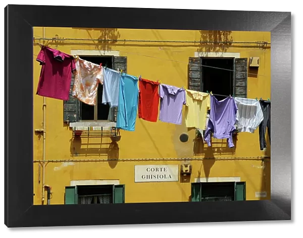 Clothes hanging on a washing line between houses, Venice, UNESCO World Heritage Site