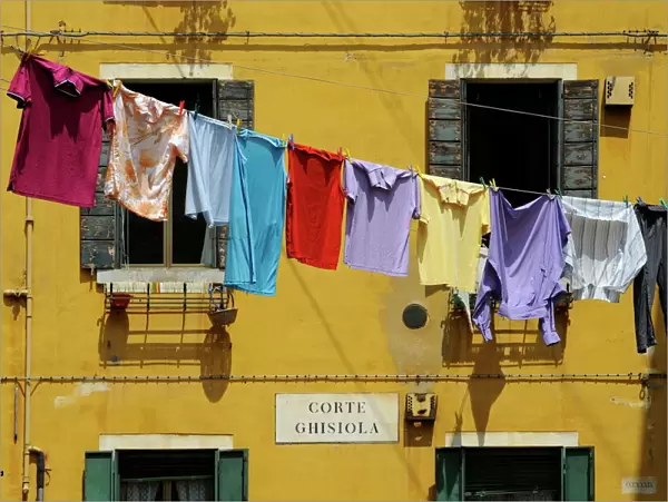 Clothes hanging on a washing line between houses, Venice, UNESCO World Heritage Site