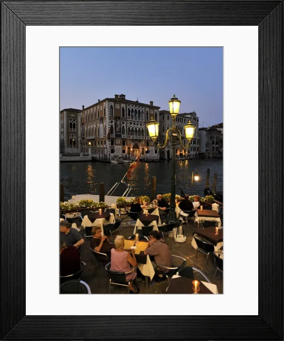 Framed Print : Evening view of a restaurant beside the Grand Canal, Venice UNESCO World Heritage Site Framed Print : Evening view of a restaurant beside the Grand Canal, Venice UNESCO World Heritage Site