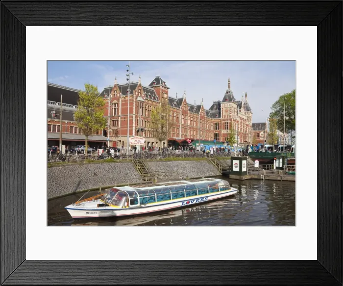Framed Print : Canal tour boat outside Centraal Station, the central train station, Amsterdam Framed Print : Canal tour boat outside Centraal Station, the central train station, Amsterdam