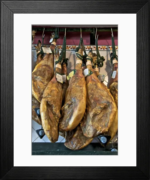 Framed Print : Spanish hams hanging in a restaurant bodega, Seville, Andalusia, Spain, Europe