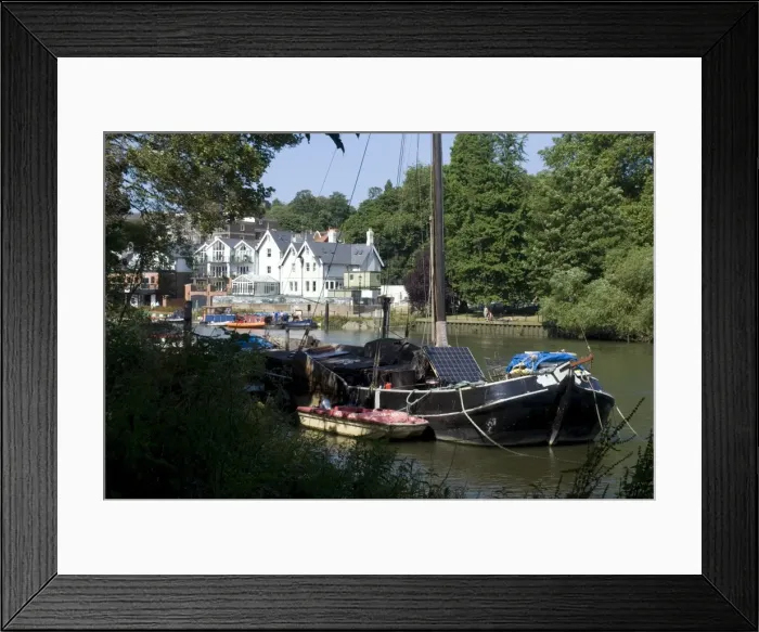 Framed Print : Boats, one with a solar panel, moored on the Thames at Richmond, Surrey Framed Print : Boats, one with a solar panel, moored on the Thames at Richmond, Surrey
