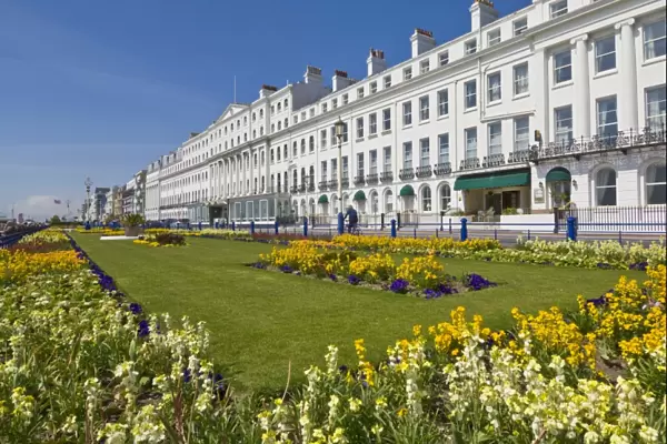 Hotels on the seafront promenade, flower filled gardens, Eastbourne, East Sussex