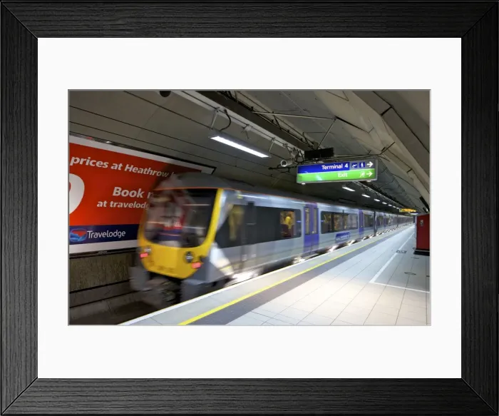 Framed Print : Heathrow Express Train arrives at Terminal 4, Heathrow Airport, London Framed Print : Heathrow Express Train arrives at Terminal 4, Heathrow Airport, London