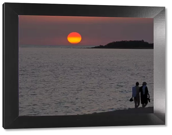 Walking couple at sunset, Playa Ancon, Trinidad, Cuba, West Indies, Caribbean