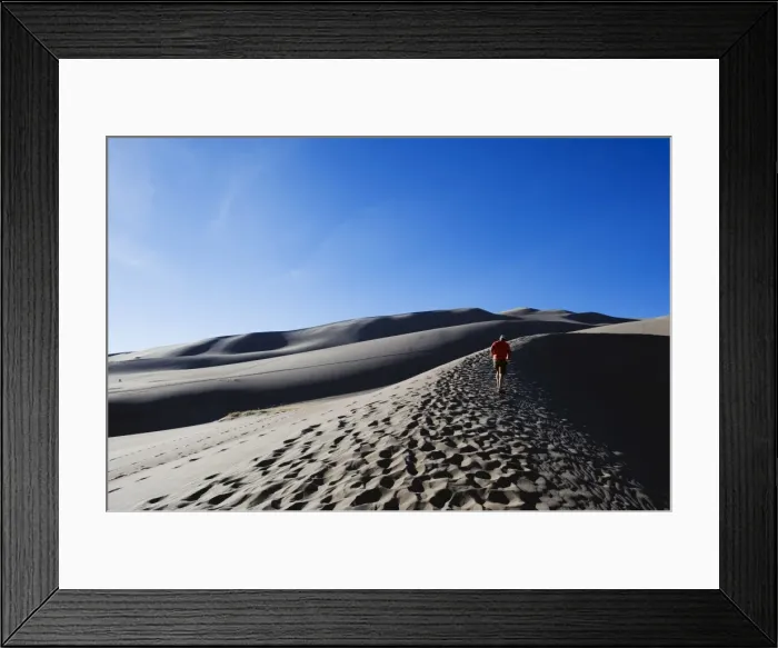 Framed Print : Hiker at Great Sand Dunes National Park, Colorado, United States of America Framed Print : Hiker at Great Sand Dunes National Park, Colorado, United States of America