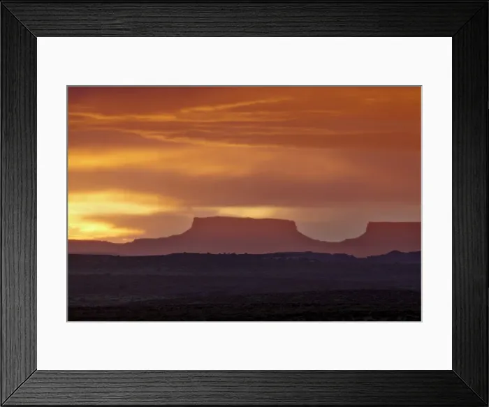 Framed Print : Orange clouds behind a butte at sunset, Canyon Country, Utah, United States of America Framed Print : Orange clouds behind a butte at sunset, Canyon Country, Utah, United States of America
