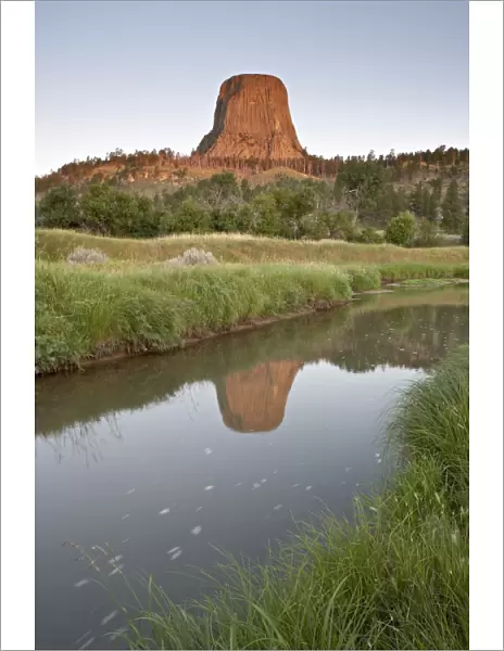 Devils Tower reflected in a stream, Devils Tower National Monument