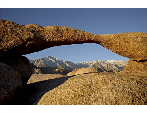 Lathe Arch framing Mount Whitney at first light Alabama Hills, Inyo National Forest