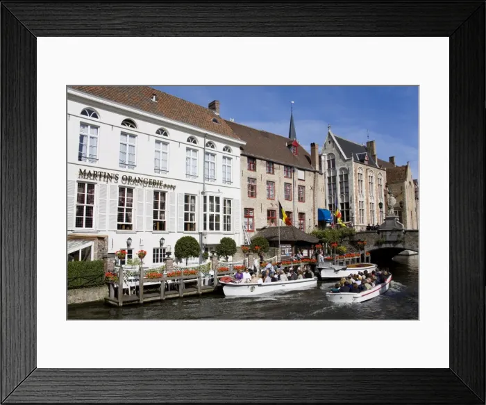 Framed Print : Tour boat on the canal in Bruges, West Flanders, Belgium, Europe Framed Print : Tour boat on the canal in Bruges, West Flanders, Belgium, Europe