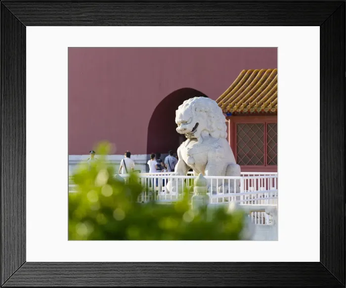 Framed Print : A stone lion greets visitors at the main entrance gate to The Forbidden City Framed Print : A stone lion greets visitors at the main entrance gate to The Forbidden City