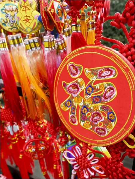 Auspicious Chinese word fu (good fortune) embroidered on a Chinese New Year ornamental souvenir