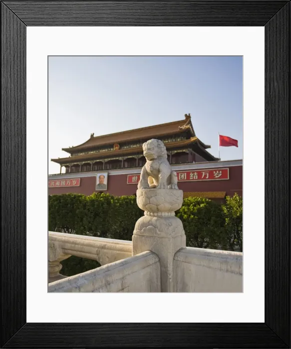 Framed Print : Stone lion statue at the main entrance to The Forbidden City, Chairman Mao Tsedongs portrait hanging above the doorway, Beijing