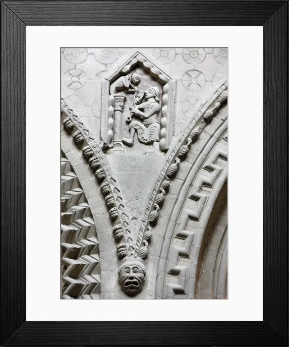 Framed Print : A 12th century corner stone depicting a man performing with a monkey, Notre Dame de Bayeux cathedral, Bayeux, Normandy Framed Print : A 12th century corner stone depicting a man performing with a monkey, Notre Dame de Bayeux cathedral, Bayeux, Normandy